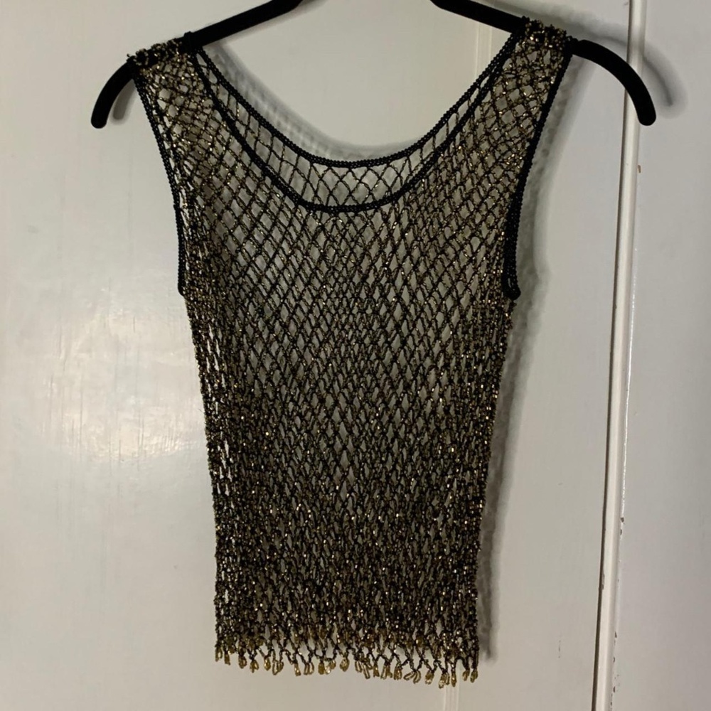 Top that goes over any other top.